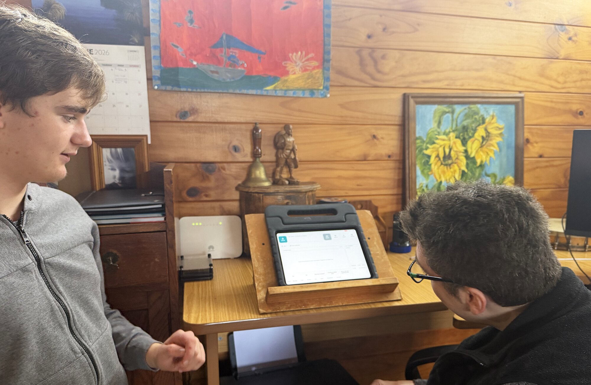 James using Parley on his iPad during a conversation.